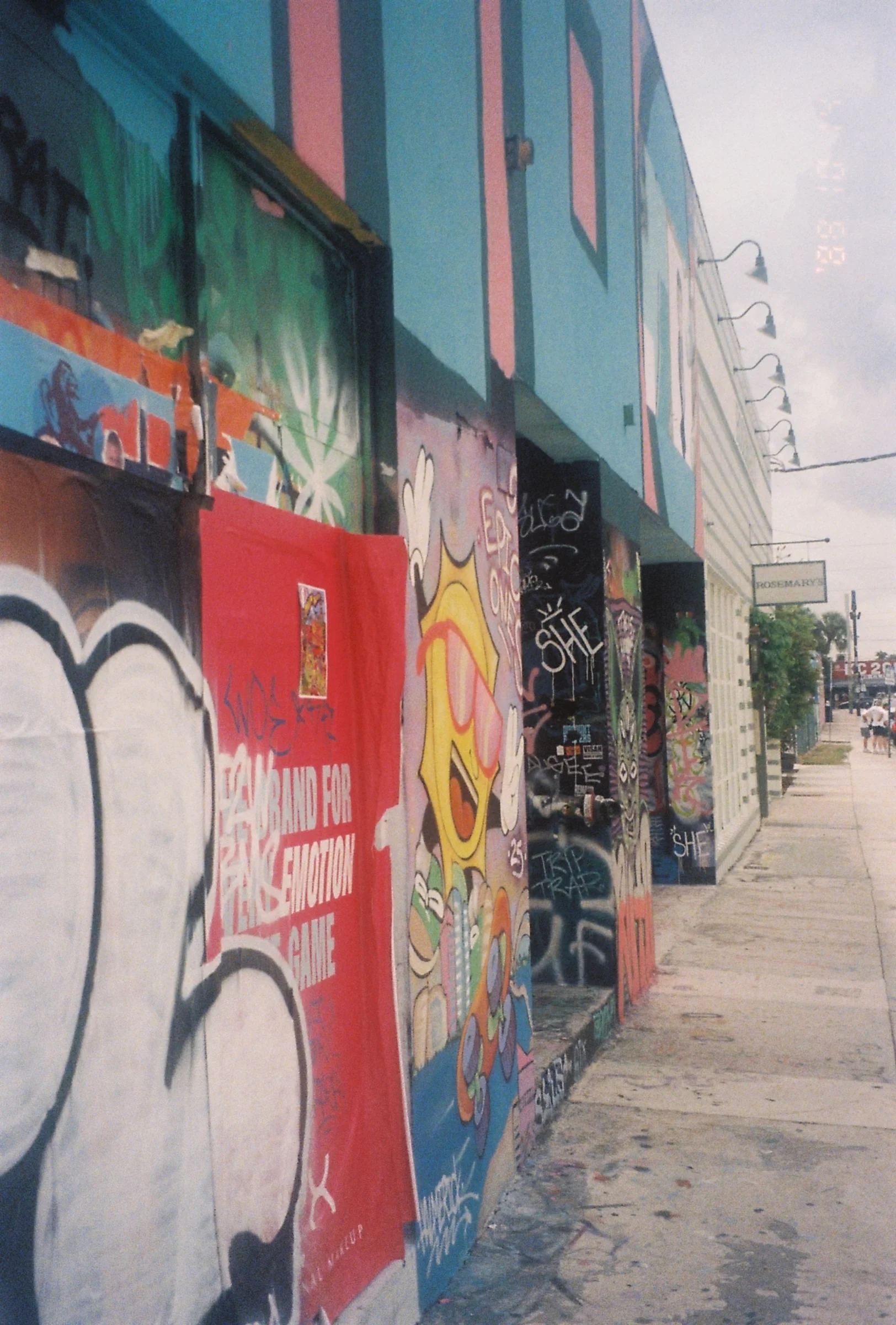 Graffiti and street art layered with posters - creating an unintentional mosaic.